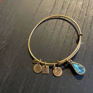 Alex and Ani Gold Bracelet with Blue Teardrop Charm